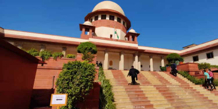 The Supreme Court mandates review of the Maharashtra Slum Areas Act, emphasizing the executive’s responsibility to oversee the implementation of laws.